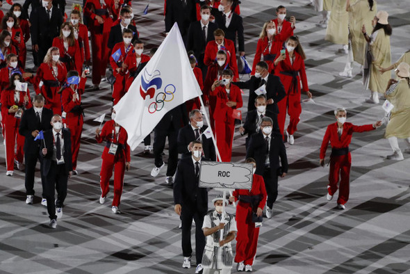 Почему российские спортсмены выступают на Олимпиаде без флага и гимна страны?