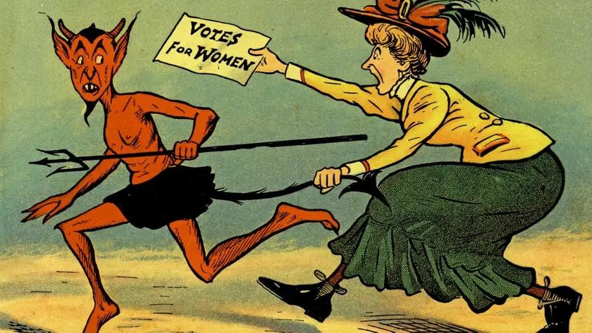Суфражистка бежит за дьяволом. Фото: Ken Florey Suffrage Collection/Getty Images